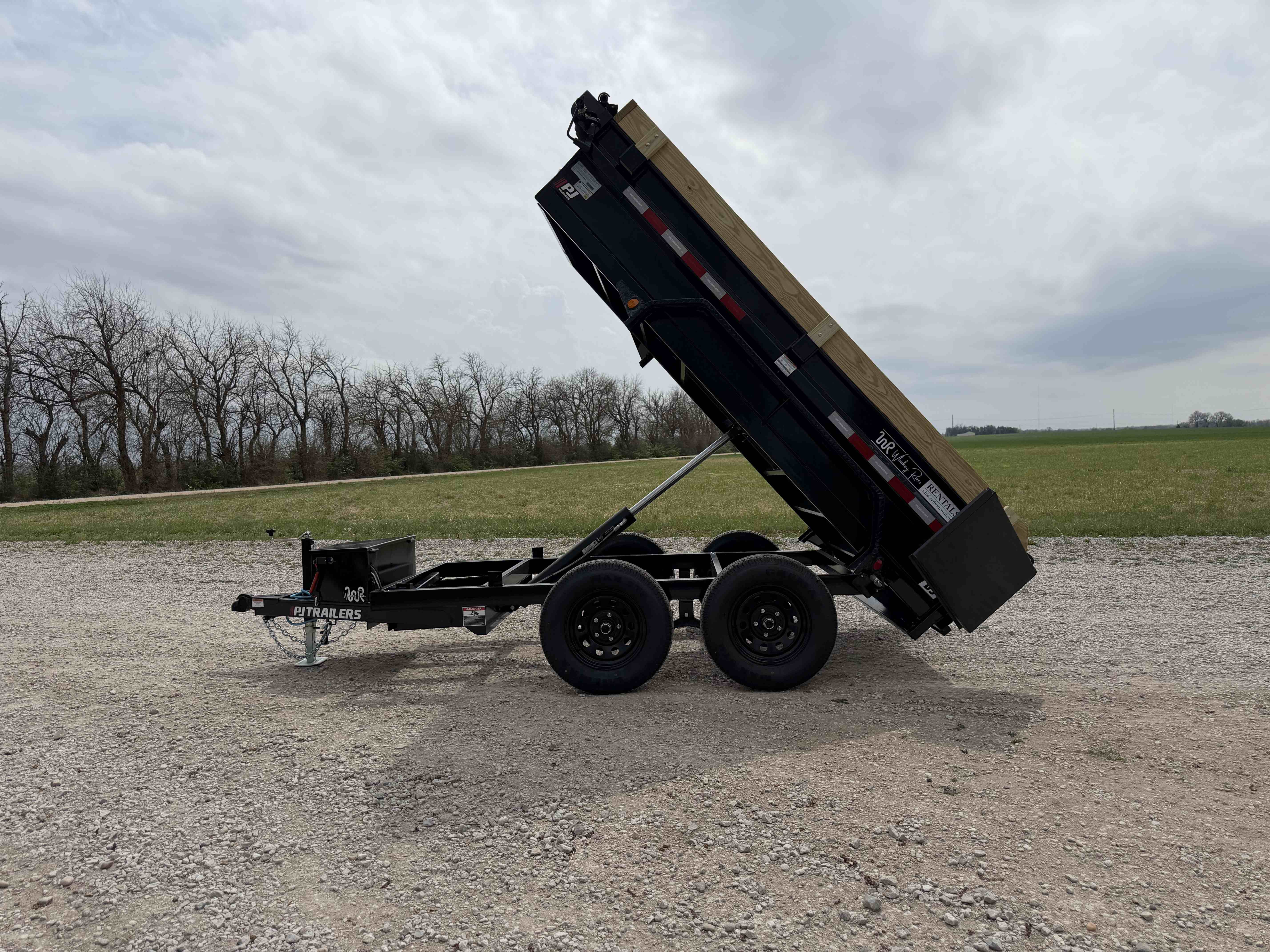 5'x10' Dump Trailer - Professional trailer rental for PJ Trailers model with 7,000 lbs GVWR